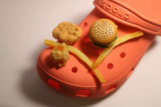 A group of croc charms resembling your favorite fast food on a croc